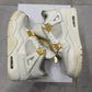 Jordan 4 Metalic Gold