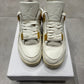 Jordan 4 Metalic Gold